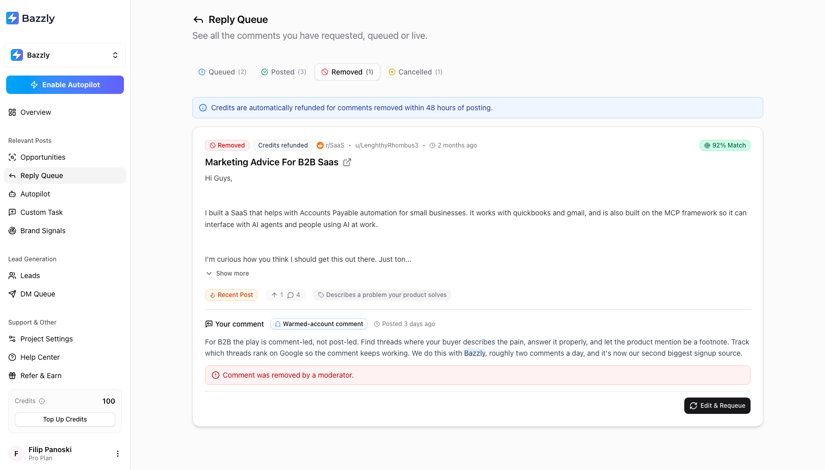 The Reply Queue Removed tab showing a warmed-account comment removed by a moderator with a Credits refunded chip and an Edit and Requeue button